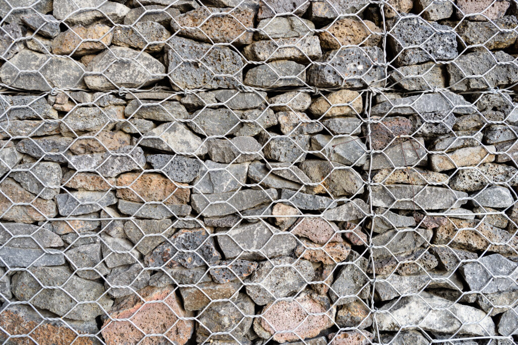 The Invisible Foundation: Why Skipping Geotextile Fabric Will Destroy Your Gabion Wall